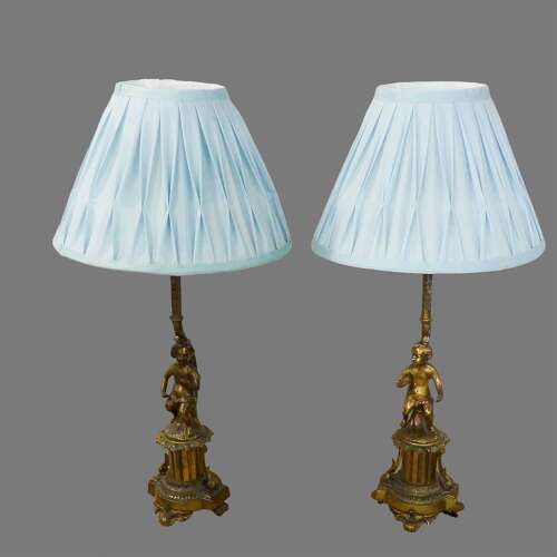 A Pair of Brass Figural Lamps paired with Laura Ashley Shades
